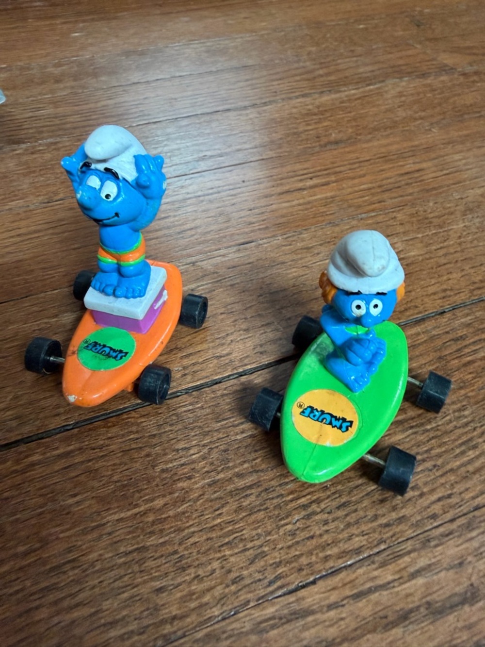 Two Smurf Peyo Skateboard Figure Toy Set with Orange and Green Boards